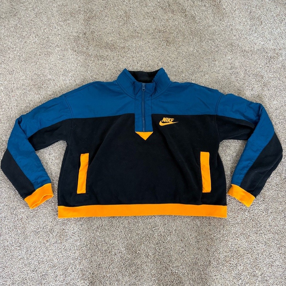 Nike women’s teal, black, and gold cropped quarter zip size M
